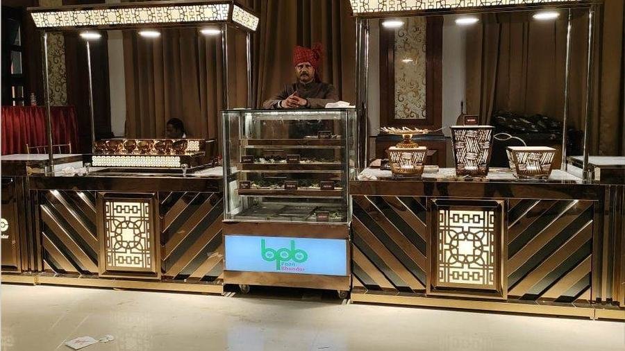 Black Rose Gold paan counter setup at a wedding